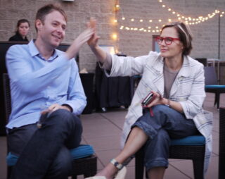 David Eaves high-fiving Jen Pahlka